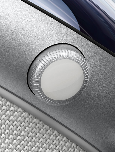Apple Vision Pro 側面特寫，展示數位旋鈕