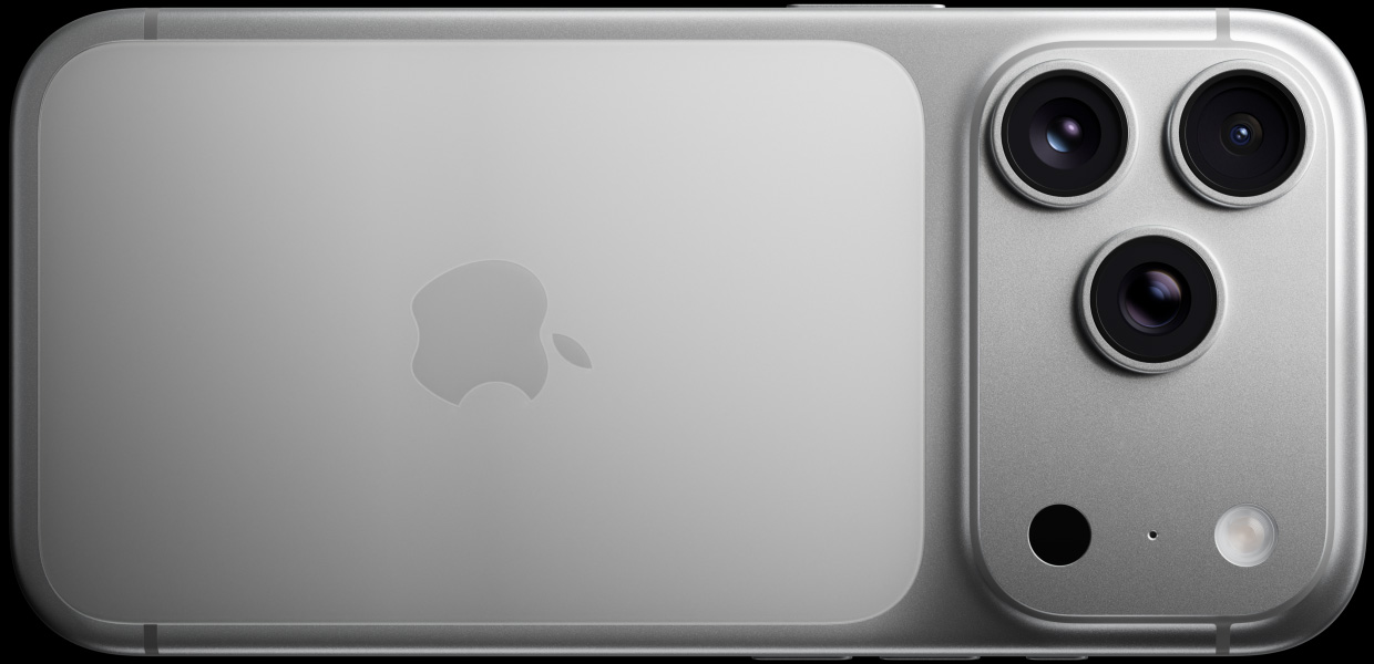 En iPhone 17 Pro i fargen sølv vises bakfra, med et Pro Fusion-kamerasystem bestående av tre objektiver, mikrofon og blits.