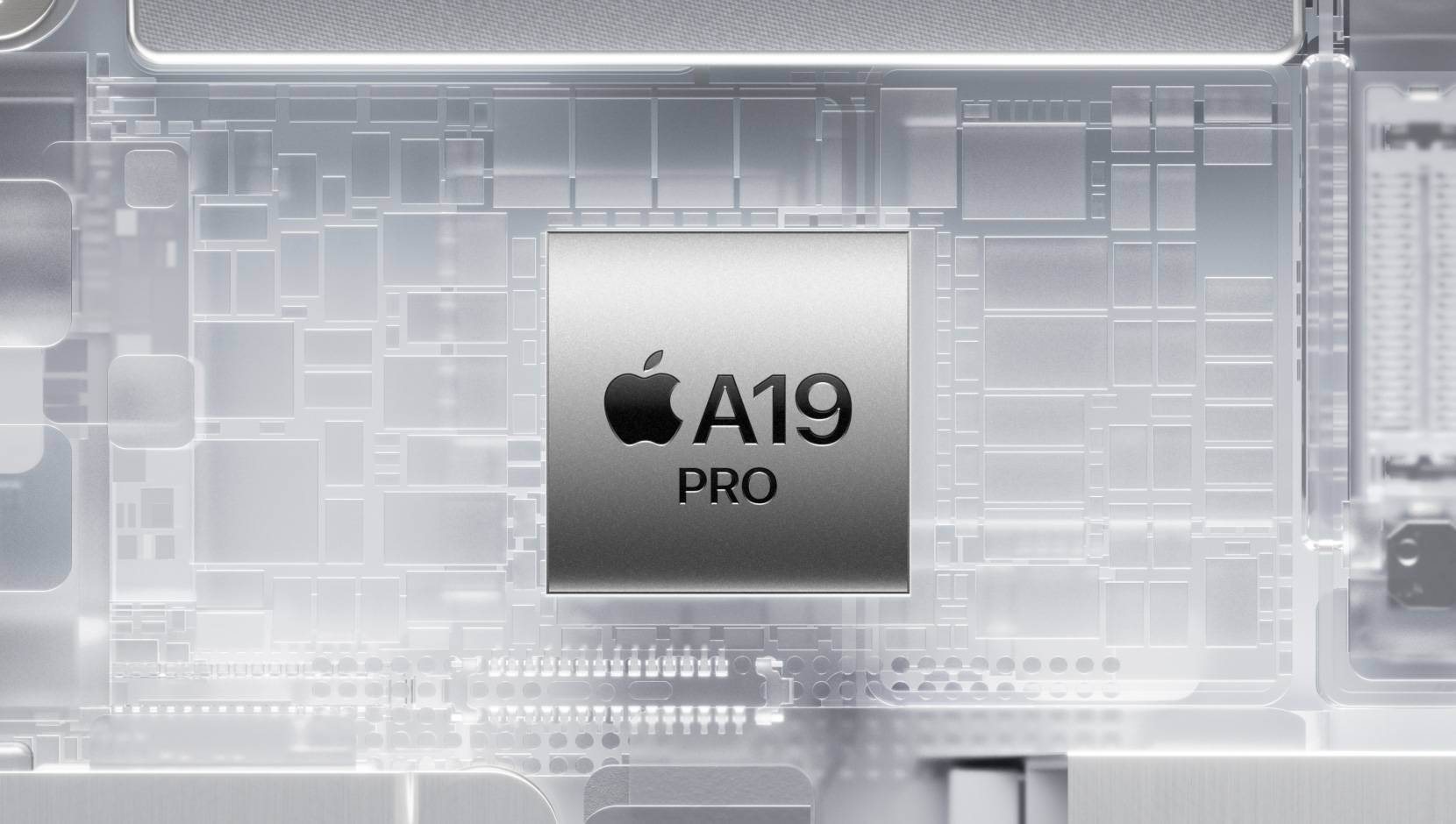 Το A19 Pro chip περιτριγυρισμένο από τα λαμπερά, εσωτερικά μέρη του iPhone